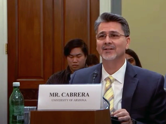 A man with salt and pepper hair speaks in a congressional hearing.